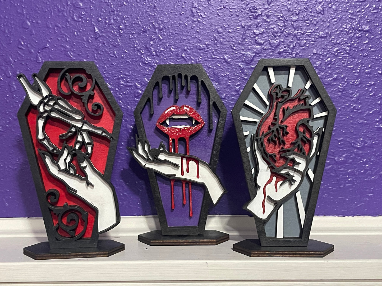 Love Bites Coffin Hand