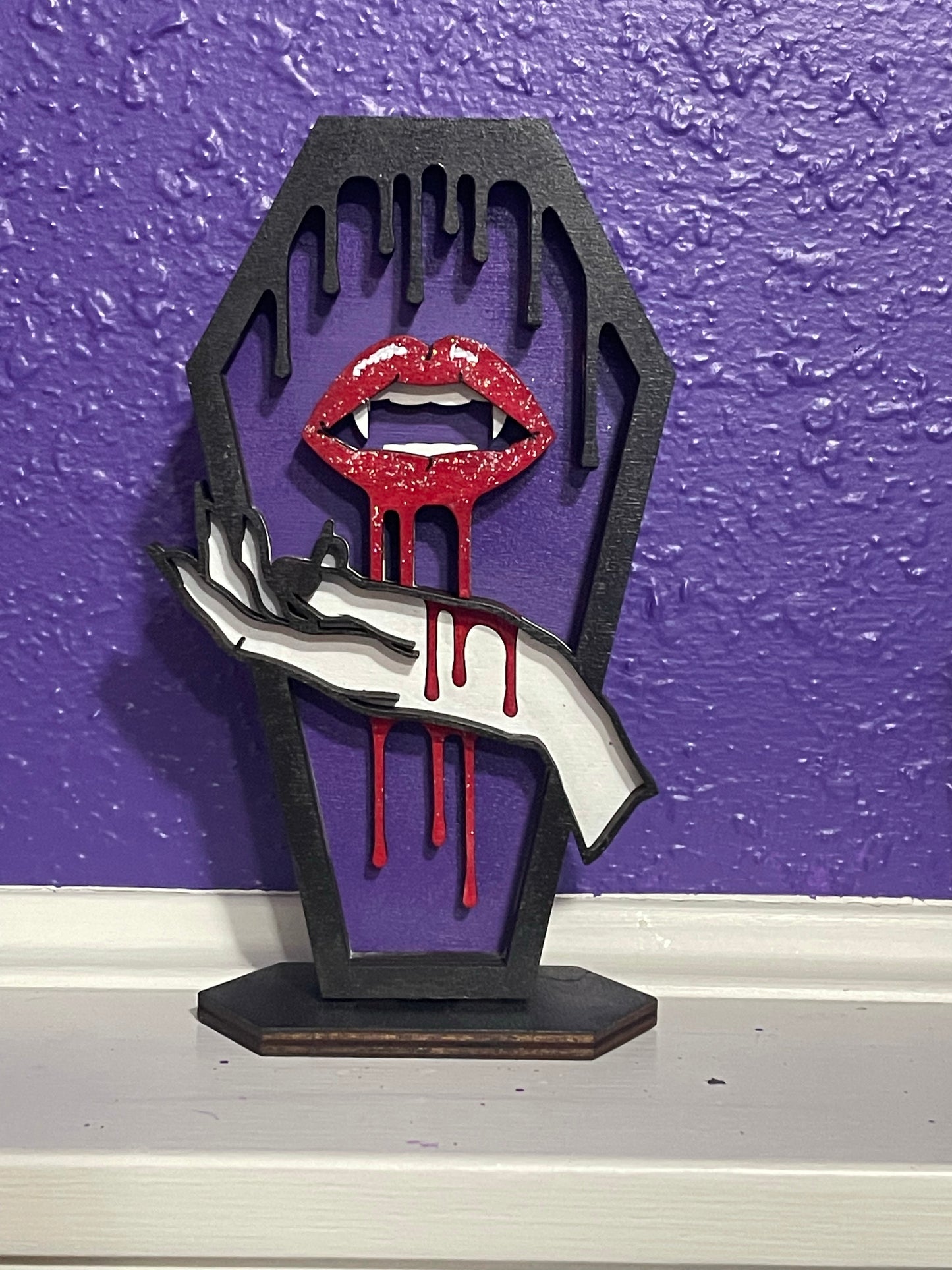 Love Bites Coffin Hand