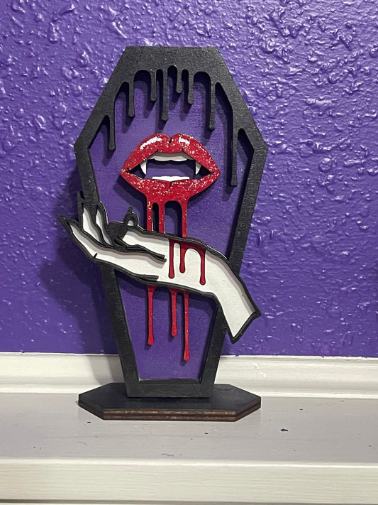 Love Bites Coffin Hand