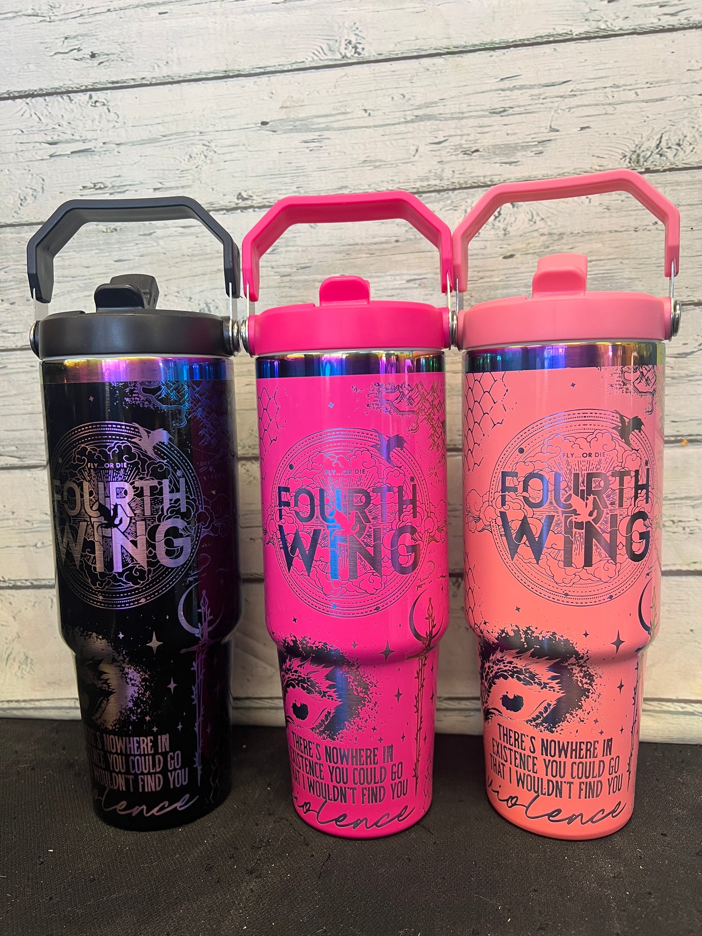 30oz Fourth Wing I am the Storm fantasy romance dragon rider engraved tumbler. Light pink, black, and hot pink powder coating with rainbow engraving. 