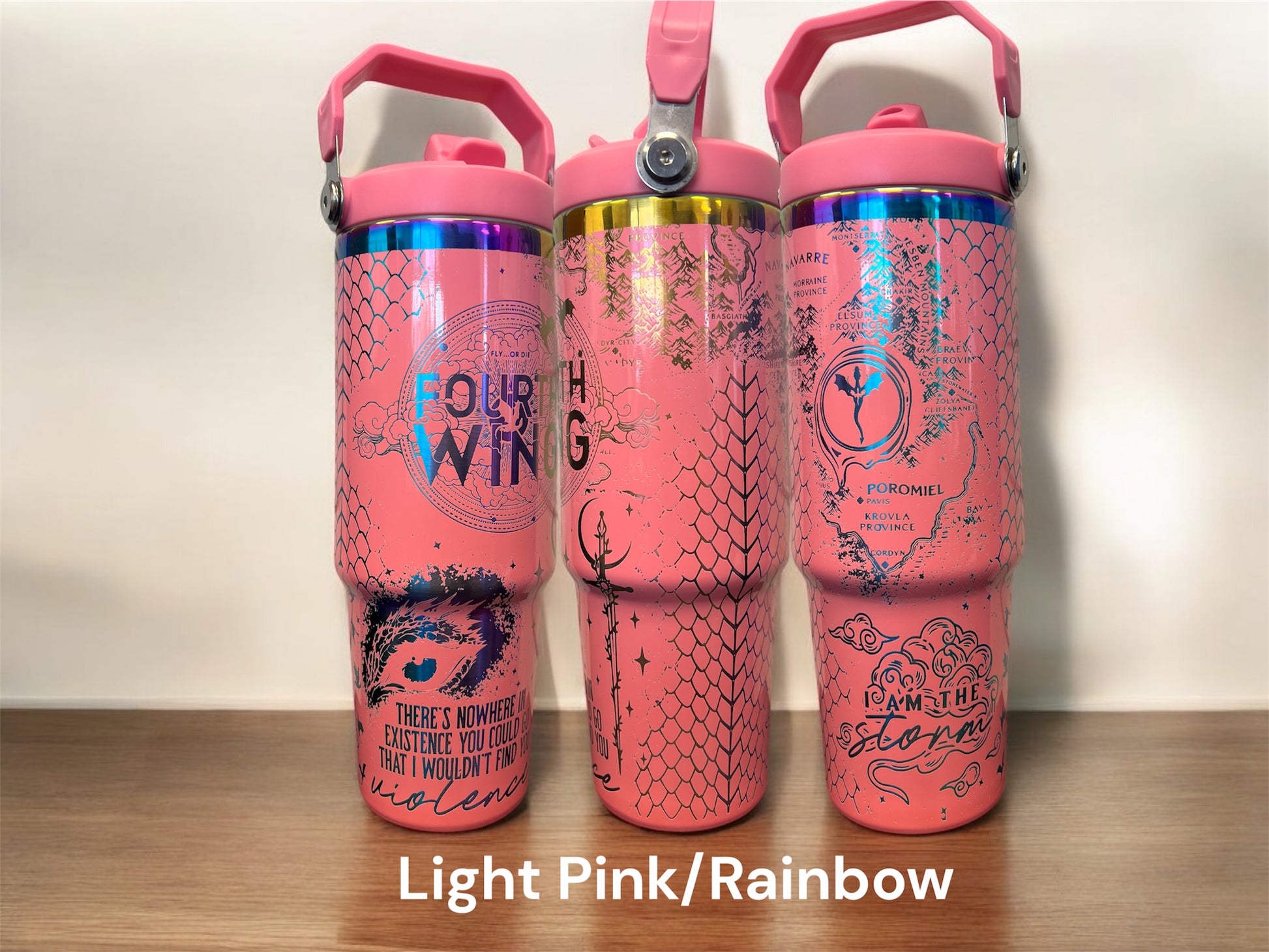 30oz Fourth Wing I am the Storm fantasy romance dragon rider engraved tumbler. Light pink powder coating with rainbow engraving. 