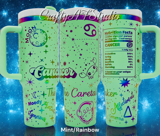 40oz Cancer Zodiac Astrological series laser engraved tumbler. Mint Powder coating with rainbow engraving. The Caretaker, Cartoon Zodiac, Snarky Zodiac, zodiac nutrition 