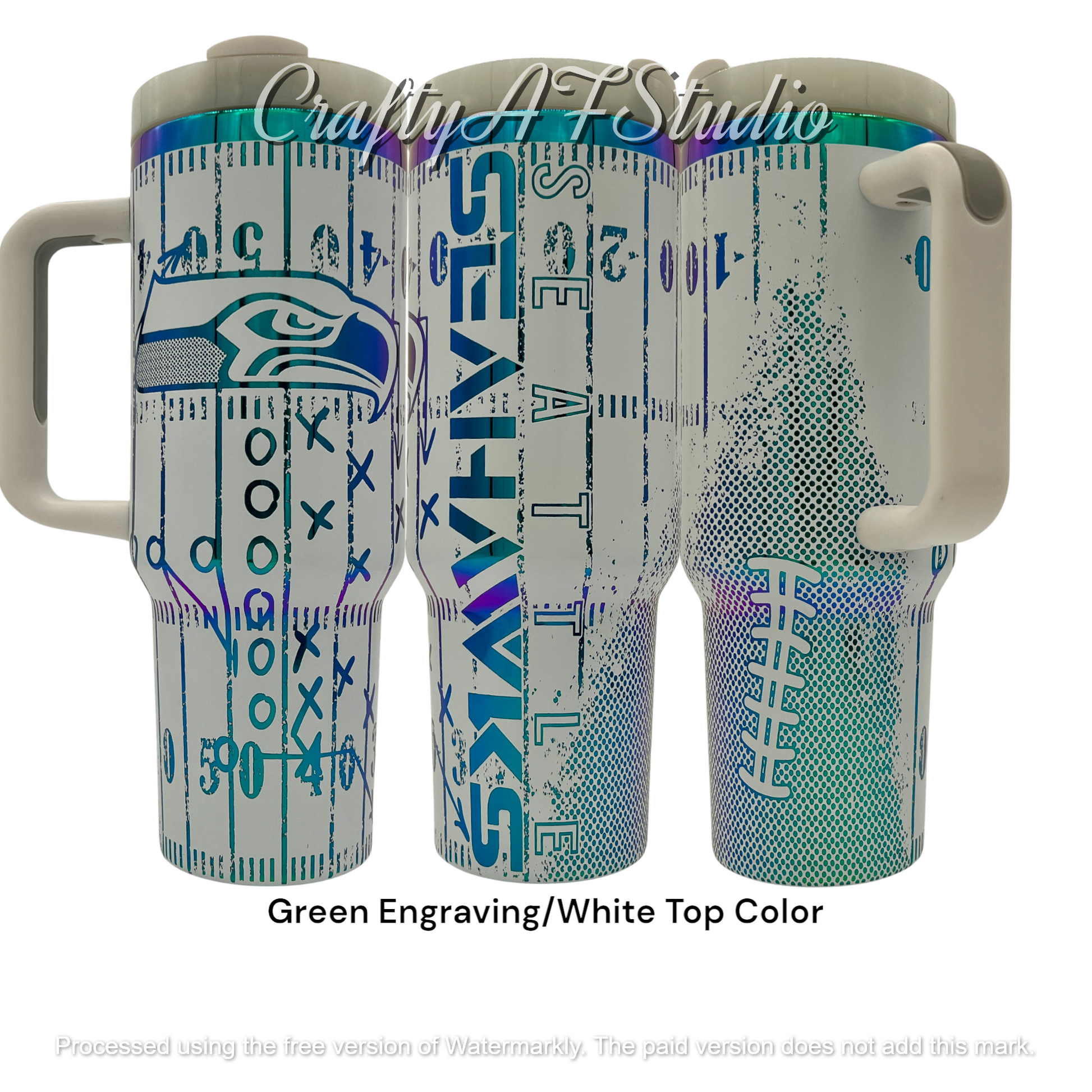 40oz Seattle Seahawks themed laser engraved tumbler. Logos with distressed field and football. Green engraving with white top color