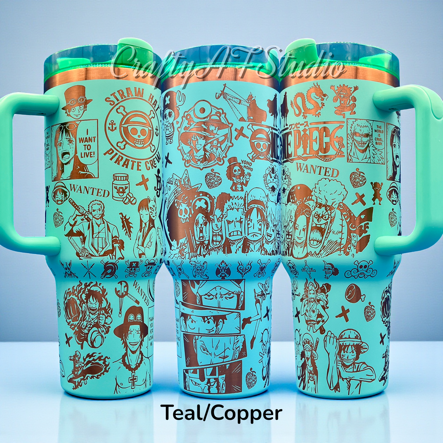 Teal travel mugs with copper One Piece designs, featuring character illustrations and pirate motifs.