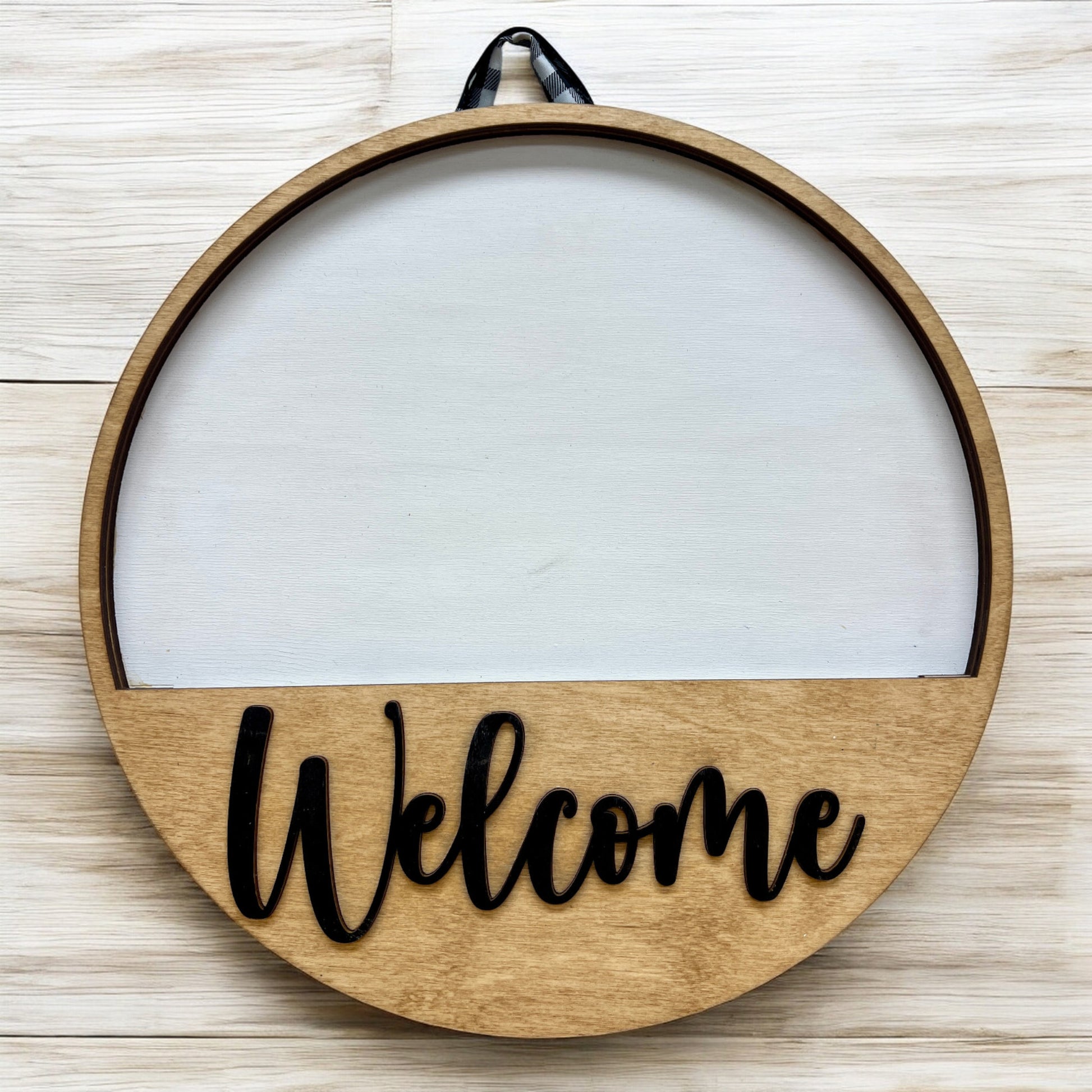 interchangeable baltic birch base for sign inserts. Light stain with white background and Black welcome