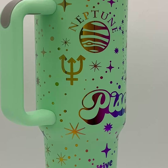 40oz Pisces Zodiac Astrological sign themed laser engraved tumbler. Mint powder coating with rainbow engraving. The Fishes snarky zodiac nutrition facts.