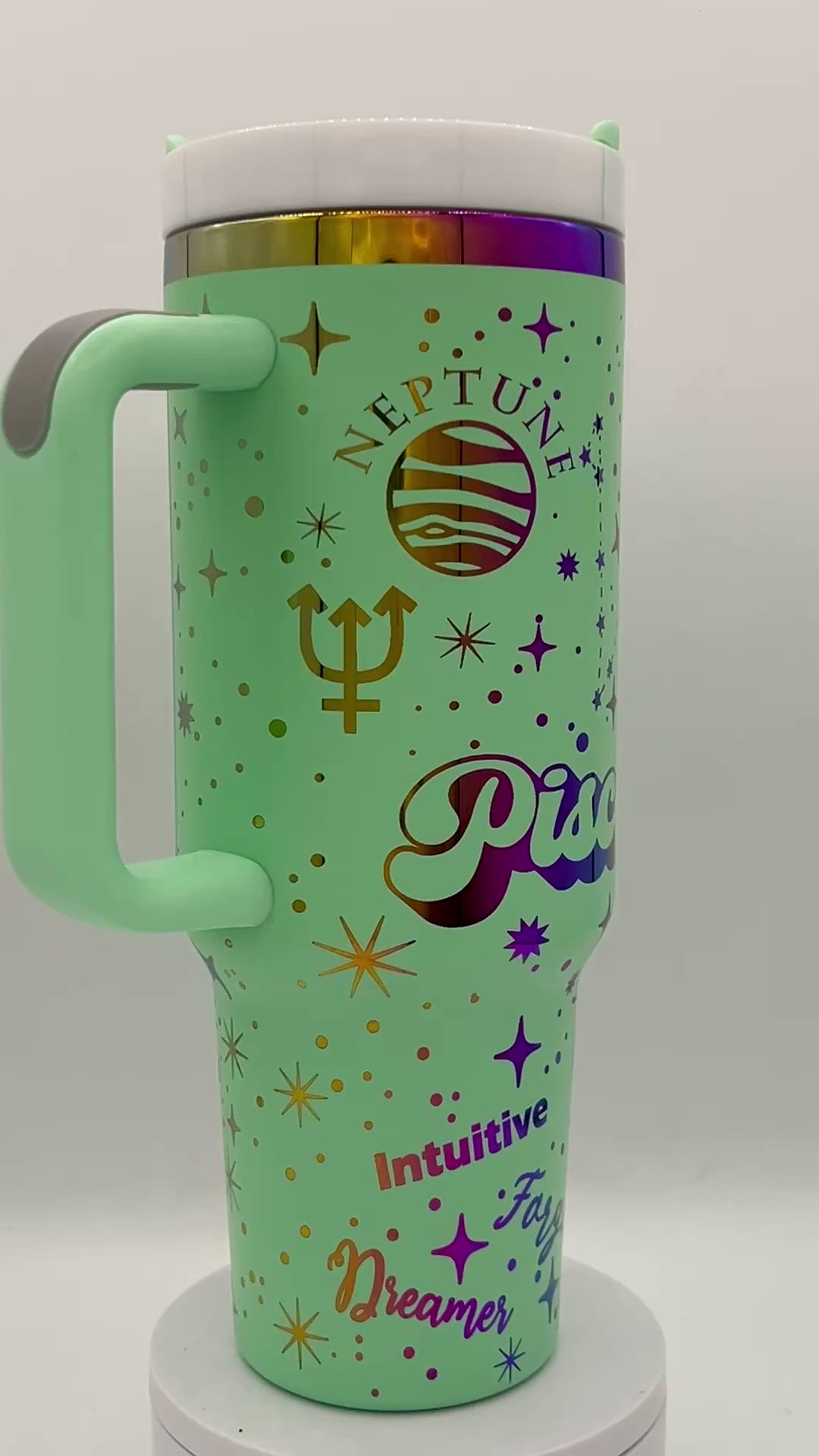 40oz Pisces Zodiac Astrological sign themed laser engraved tumbler. Mint powder coating with rainbow engraving. The Fishes snarky zodiac nutrition facts.