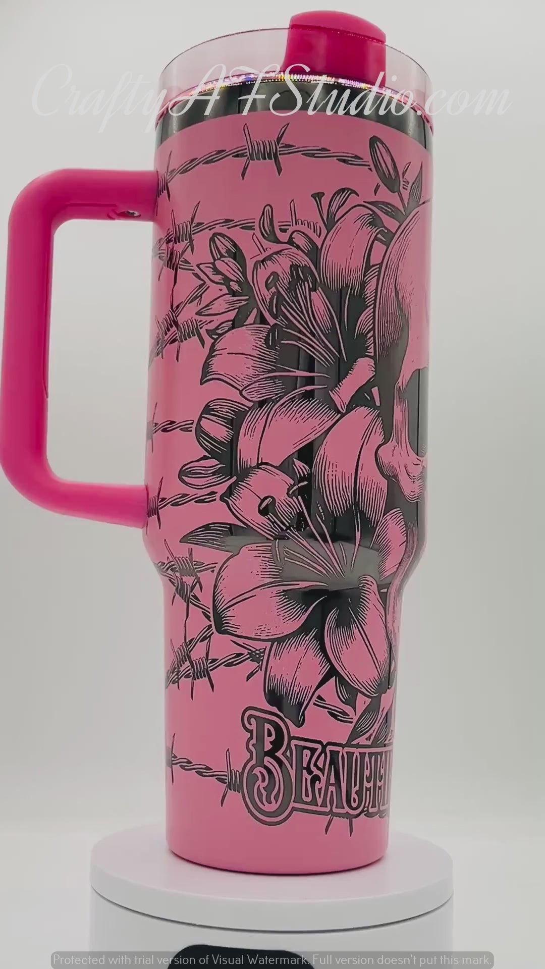 40oz Beautiful Disaster skull with lilies and barb wire laser engraved tumbler. Black engraving with Light Pink top  color