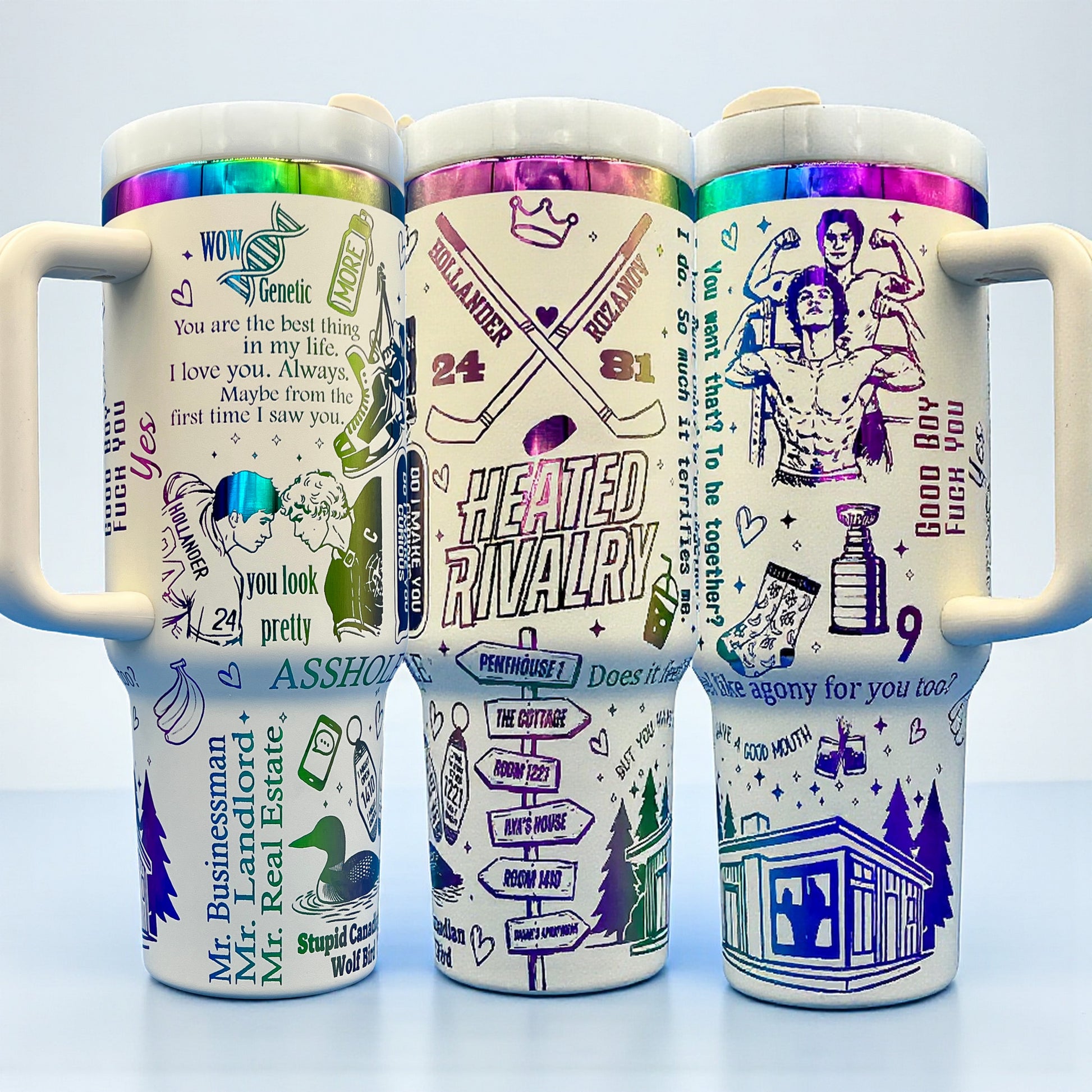 Three colorful mugs with intricate, playful text and graphics, featuring rainbow lids on a light background.